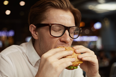 Man eating a hamburger