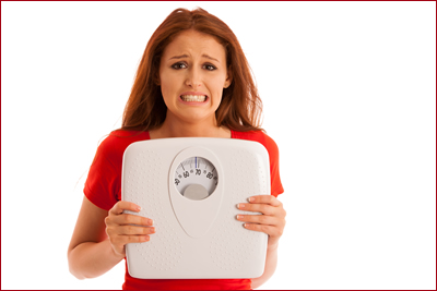 Woman holding scales