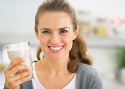 Woman drinking protein shake