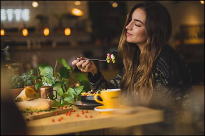 Woman eating dinner