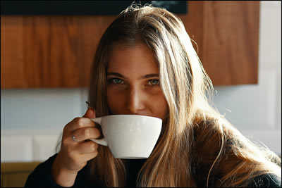 Woman drinking coffee